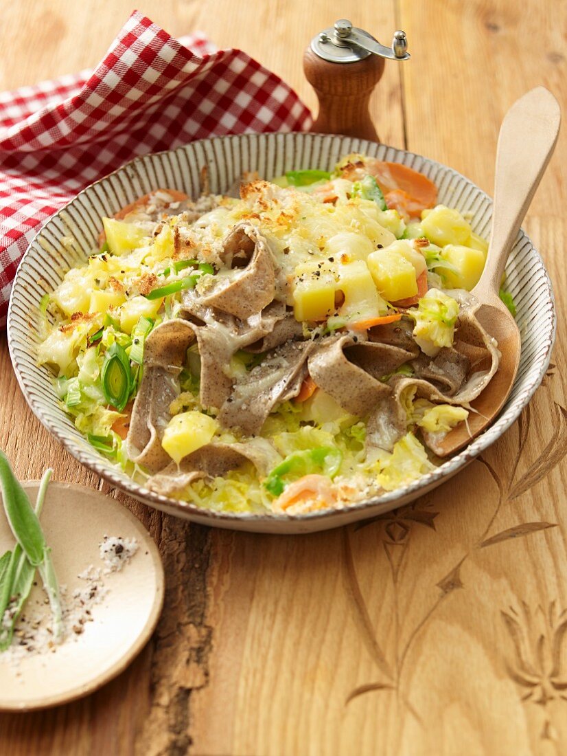 Pizzoccheri with savoy cabbage, potatoes, leek and cheese