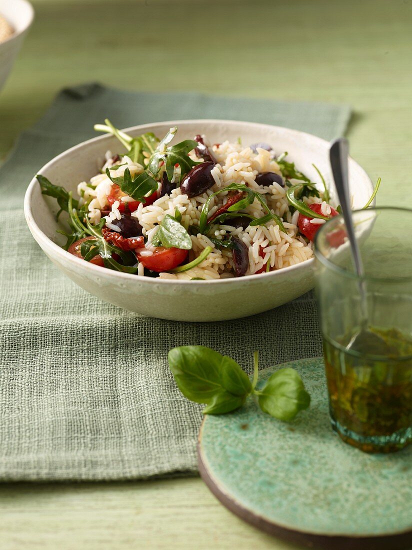 Italian rice salad with dried tomatoes and olives