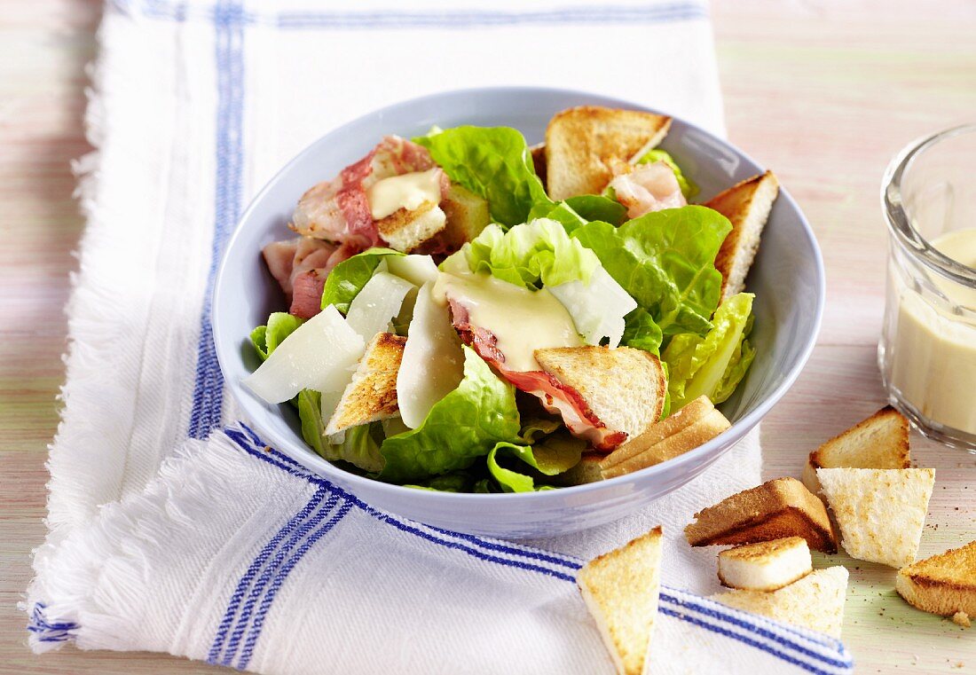 Caesar salad with toast triangles