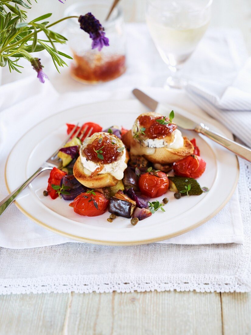 Goats cheese with chutney on roasted vegetables