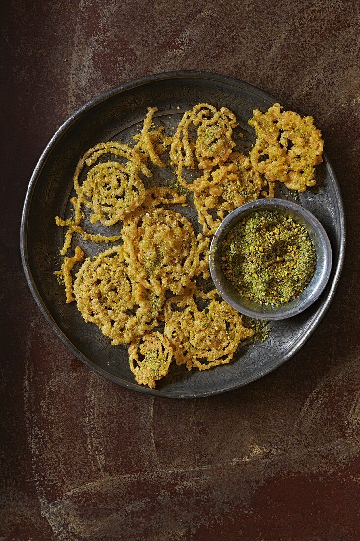 Saffron fritters with pistachio sugar (Persia)