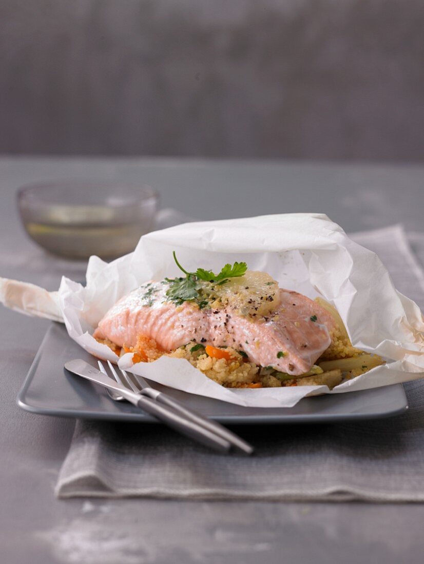 Salmon with couscous in parchment paper