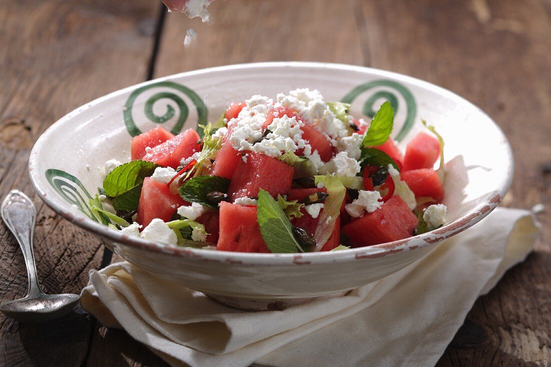 A watermelon salad with feta cheese and mint