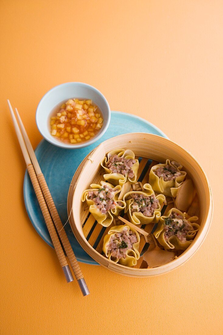 Steamed duck wontons with peach sambal (Asia)