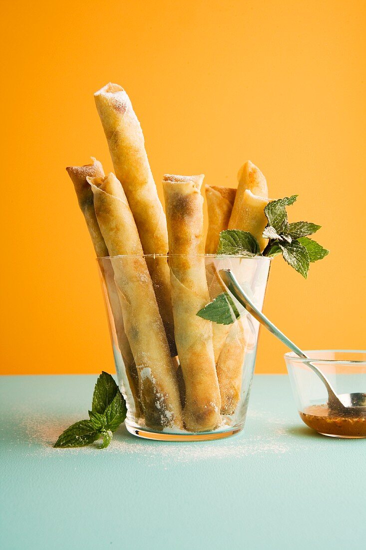 Sweet spring rolls filled with blueberry quark with a honey dip