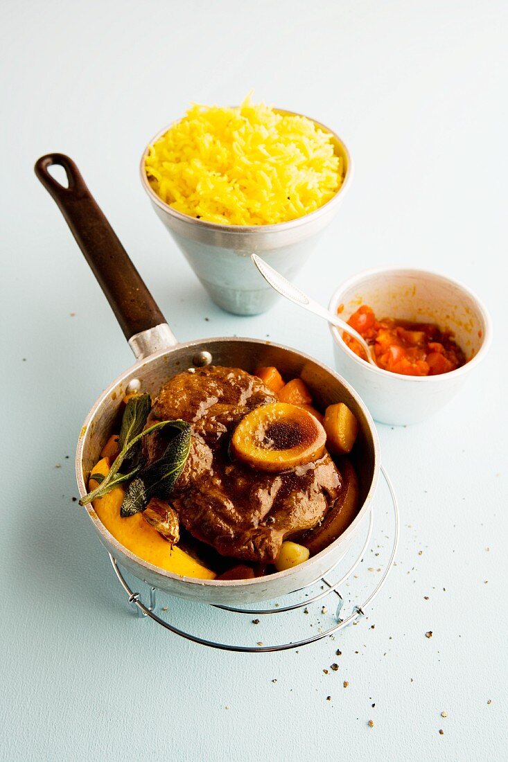 Braised orange veal knuckle with chermoula and yellow basmati rice