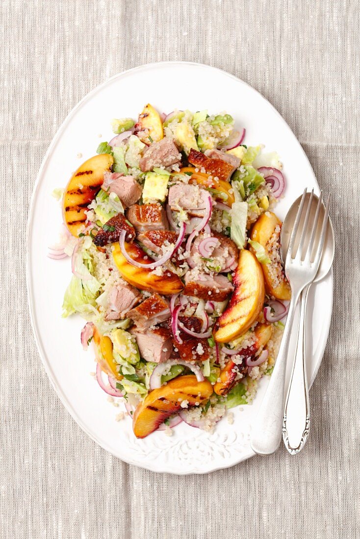 A salad with quinoa, duck and grilled nectarines