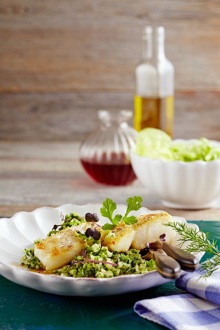 Fried cod fillet with a cucumber salsa