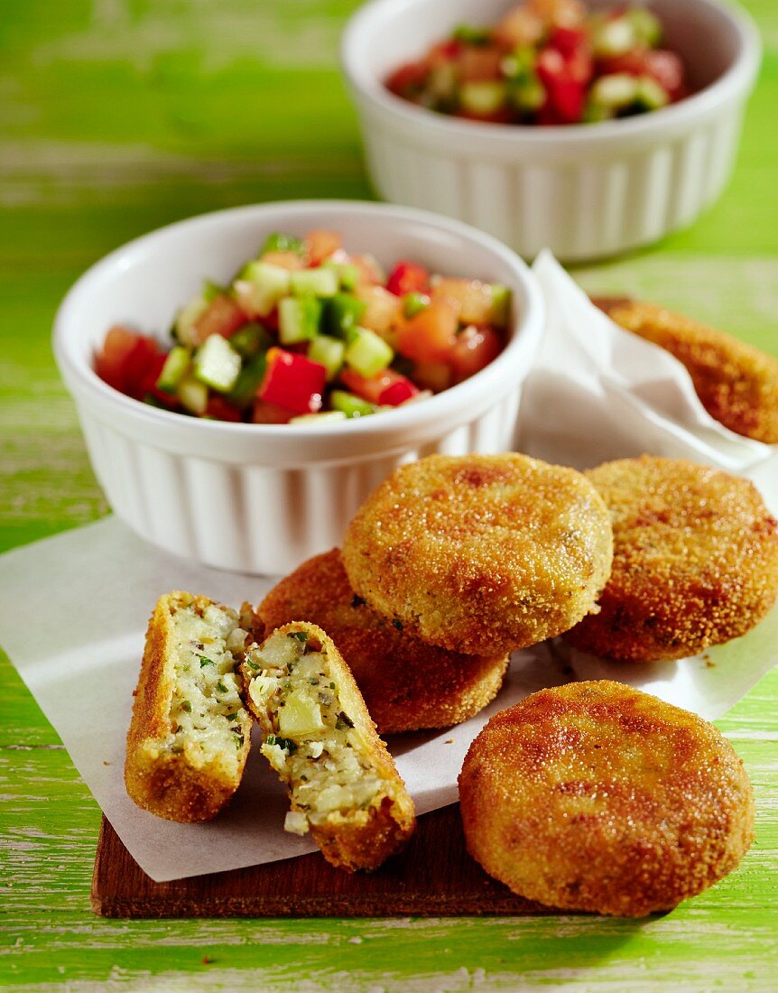 Pepper and cucumber salad with potato cakes