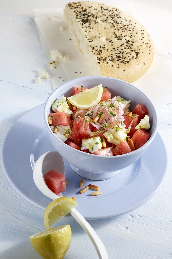 Watermelon salad with feta cheese and onions