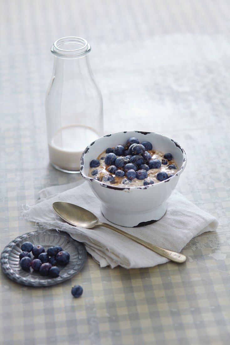 Vegan power muesli with blueberries and almond milk
