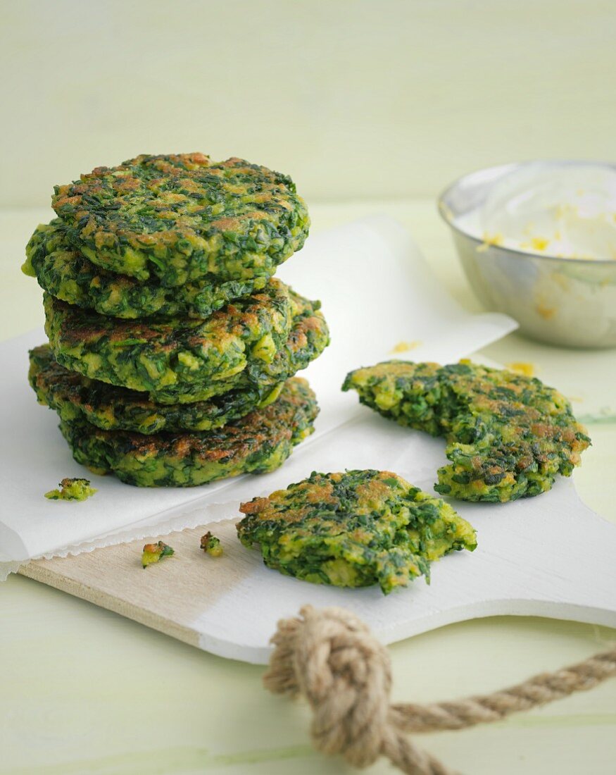 Green spinach fritters with a lemon dip