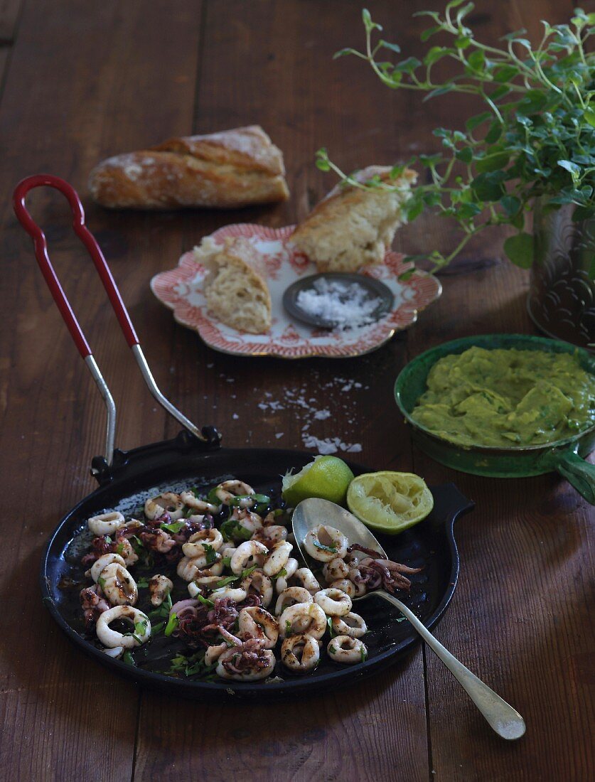 Squid with chilli, limes, grilled parsley and guacamole