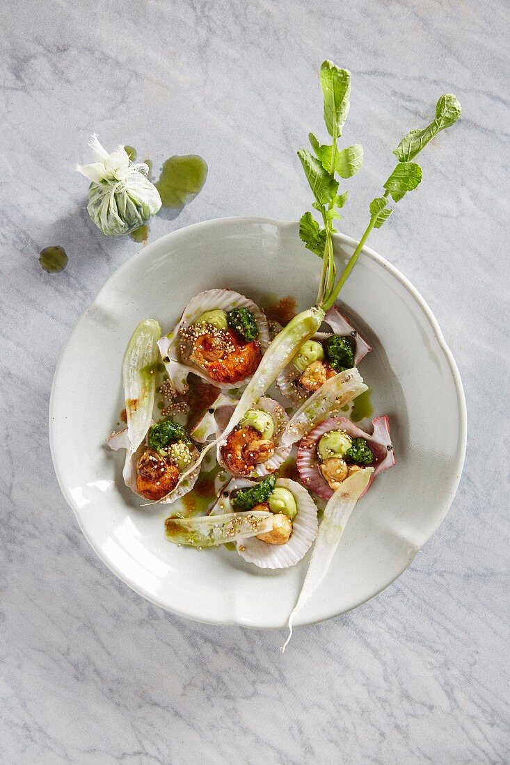 Scallops with avocado cream, daikon root and coriander jus