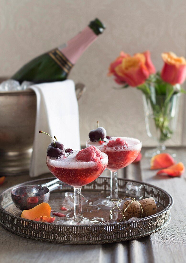 Berry sorbet in champagne with cherries