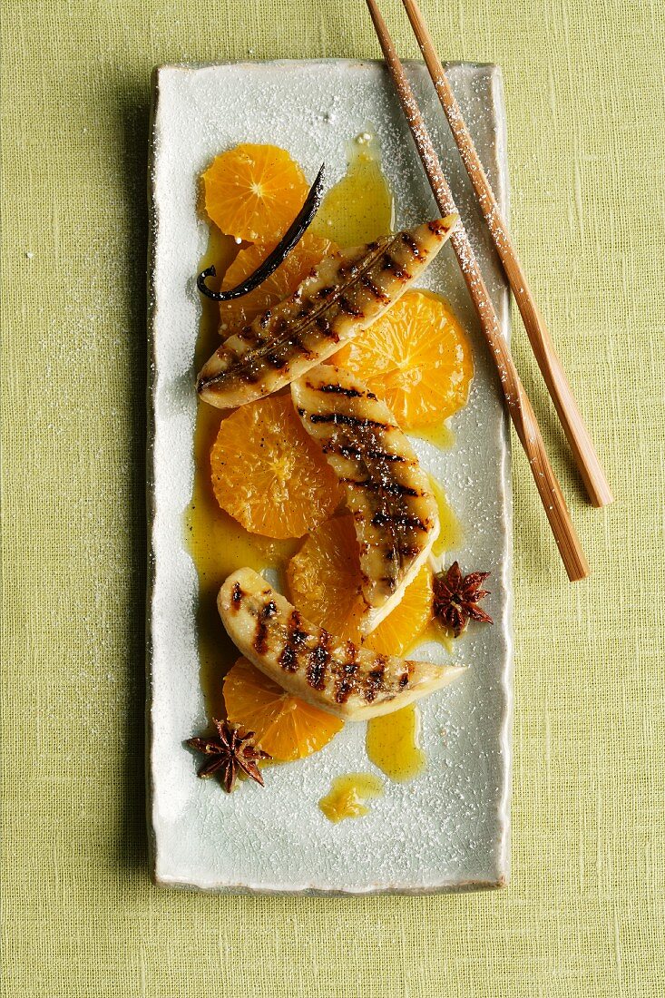 Grilled bananas in an orange and ginger ragout