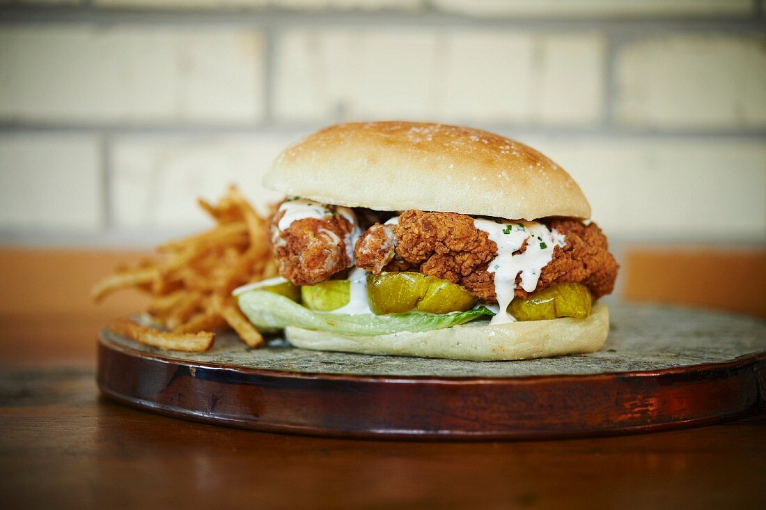 Chicken, horseradish gherkins, cos lettuce and ranch dressing with kefir on an artisan roll