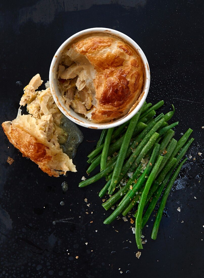 A chicken pie with green beans