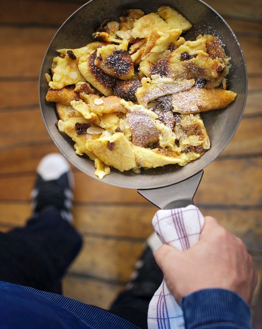 Caramelised Kaiserschmarrn (shredded sugared pancake from Austria) with raisins and icing sugar