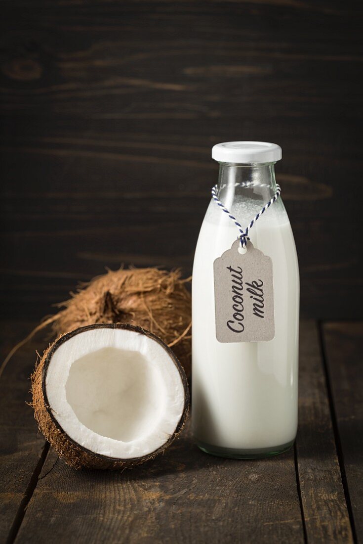 Coconut milk in a glass bottle with a label