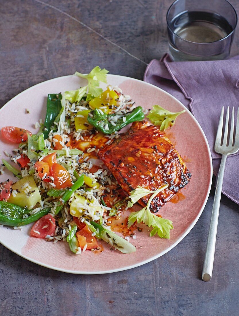 Creole salmon with wild rice and colourful vegetables