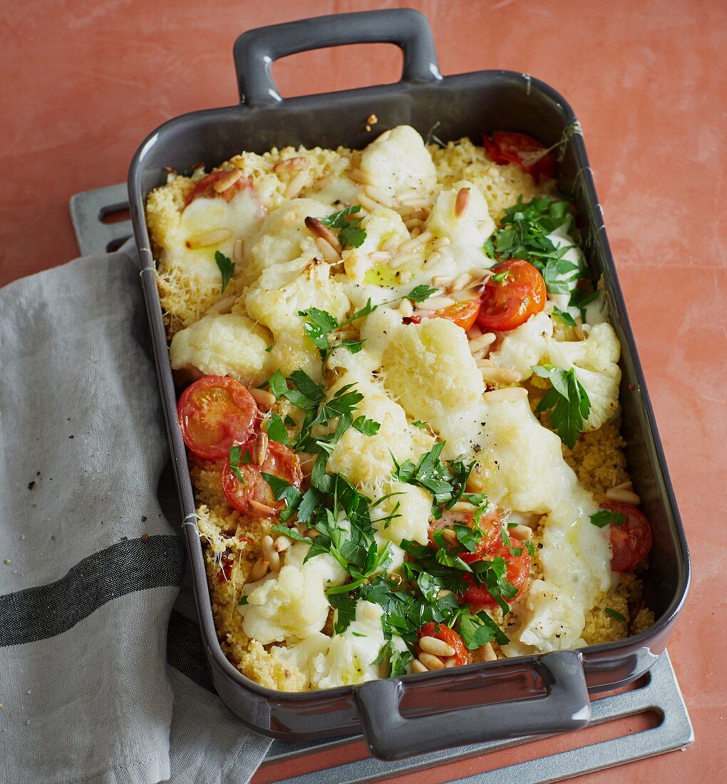 Cauliflower bake with couscous, tomatoes and mozzarella cheese