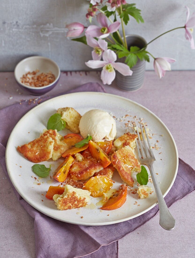 Shredded semolina pancakes with glazed sharon fruit and vanilla ice cream