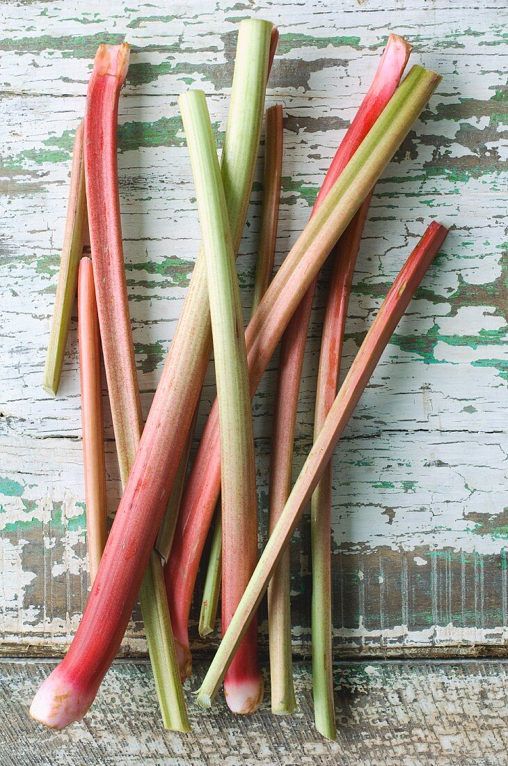 Rhubarb spears on a wooden table