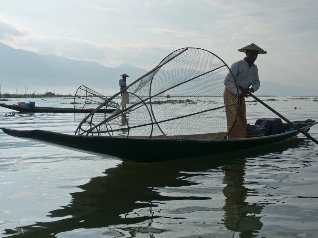 Fishermen casting their nets in Inle Lake, Shan State, Myanmar (Burma), Asia