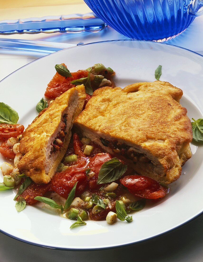 Stuffed pork escalope with tomatoes and spring onions