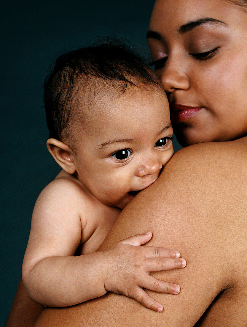 Mother holding her baby