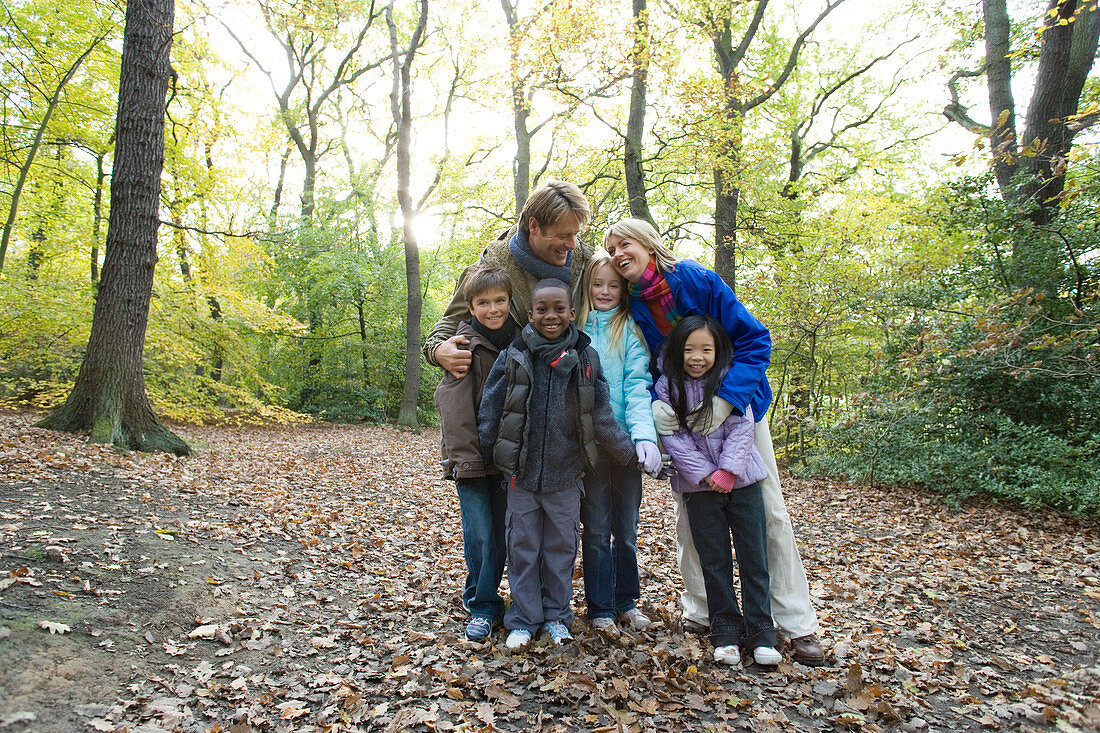 Parents and children in a wood