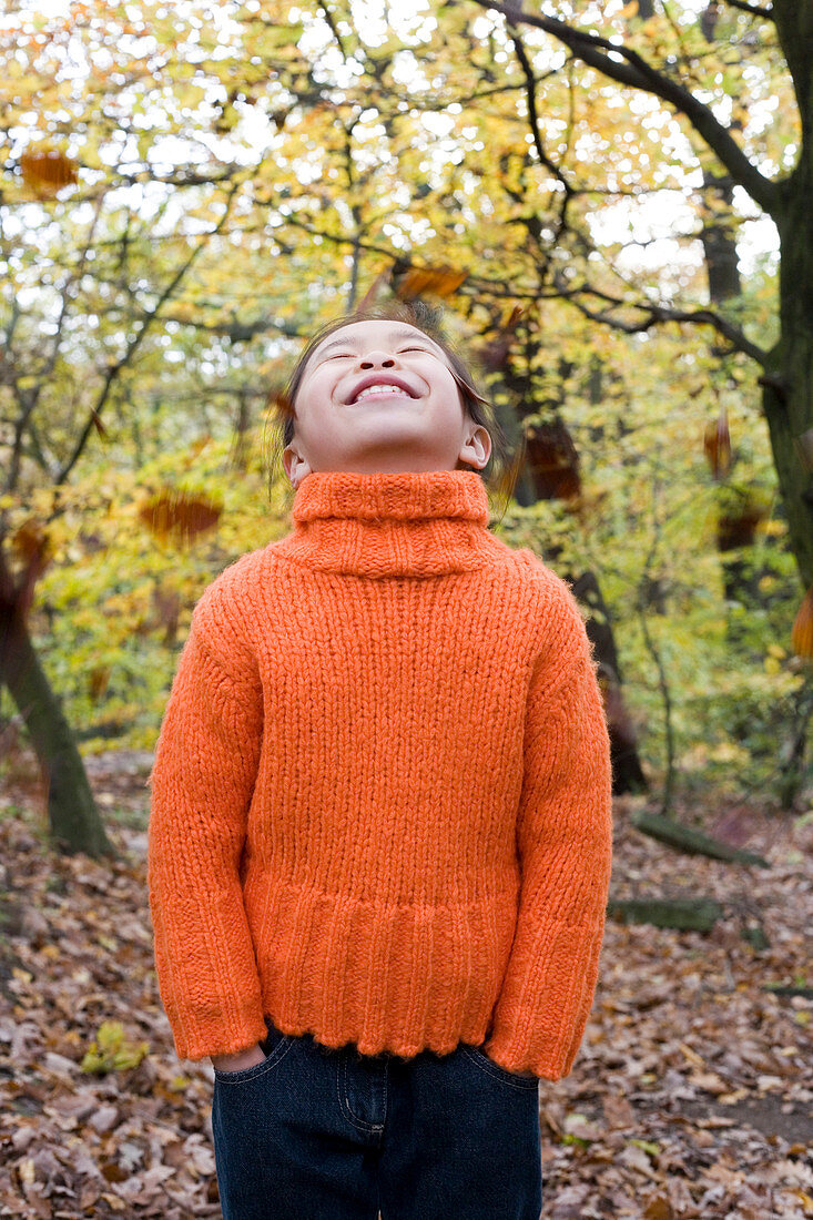 Smiling girl in a wood