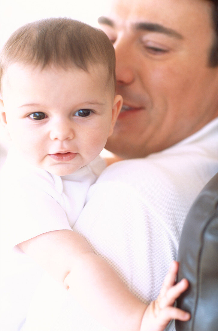 Baby girl and father