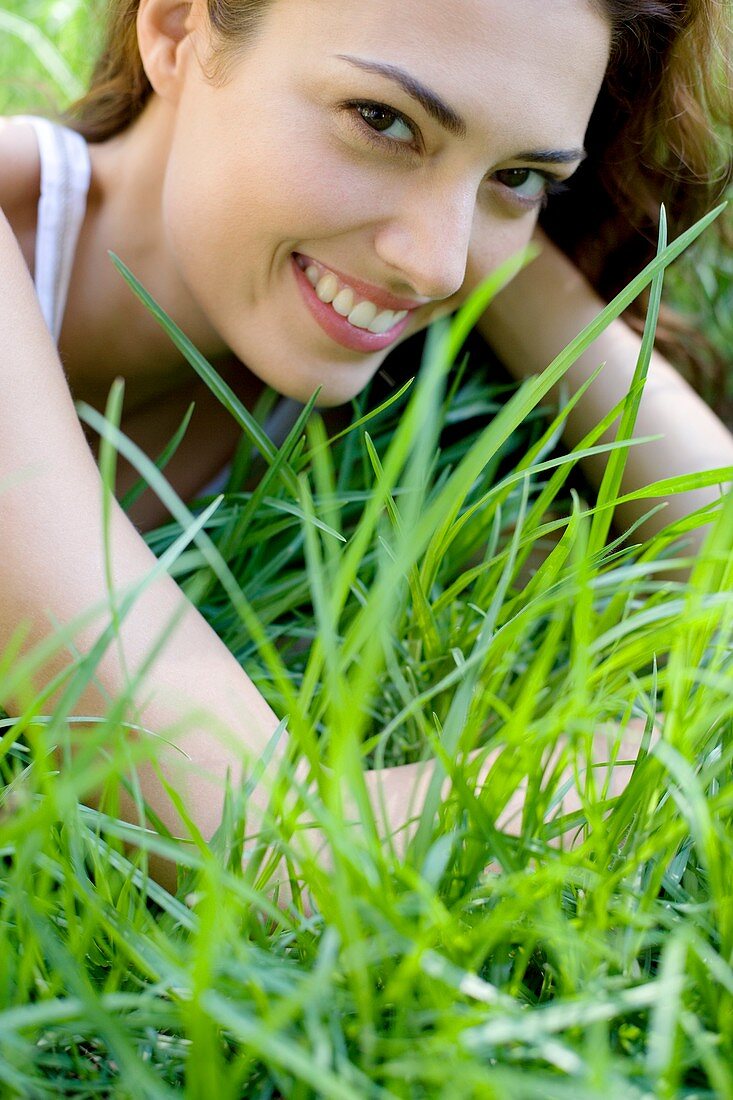 Woman lying on the grass