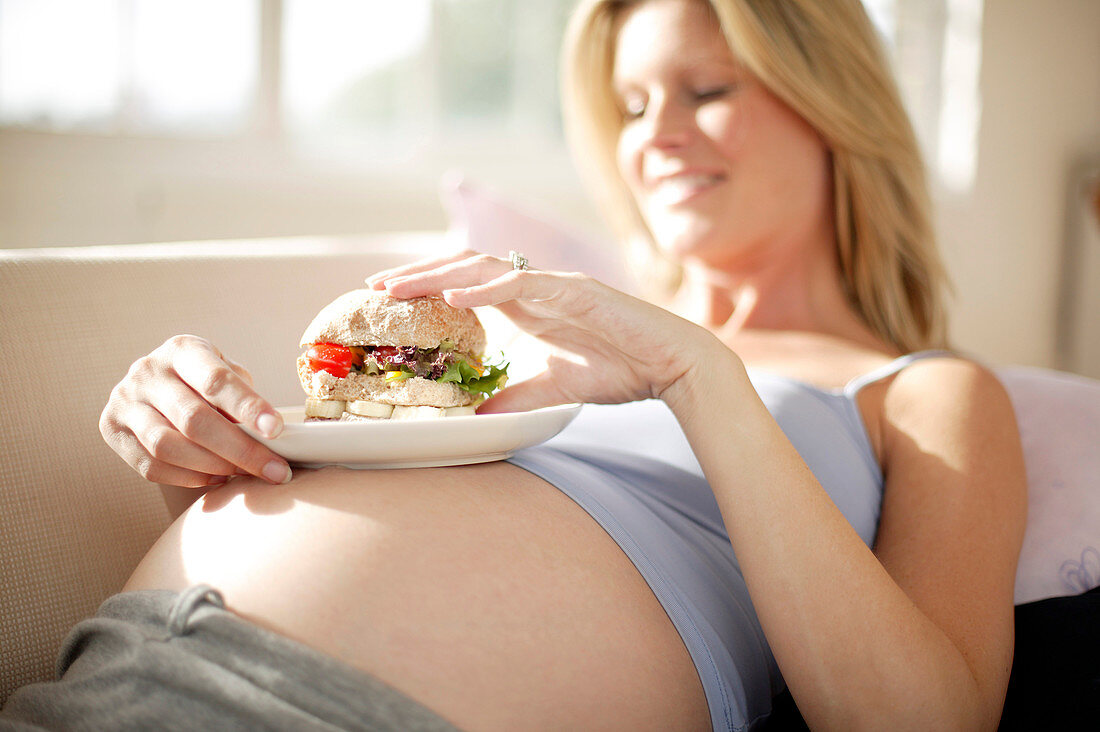 Pregnant woman eating