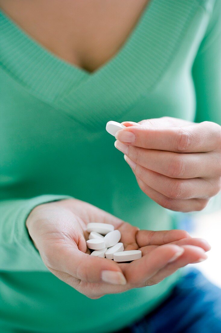 Woman taking medication