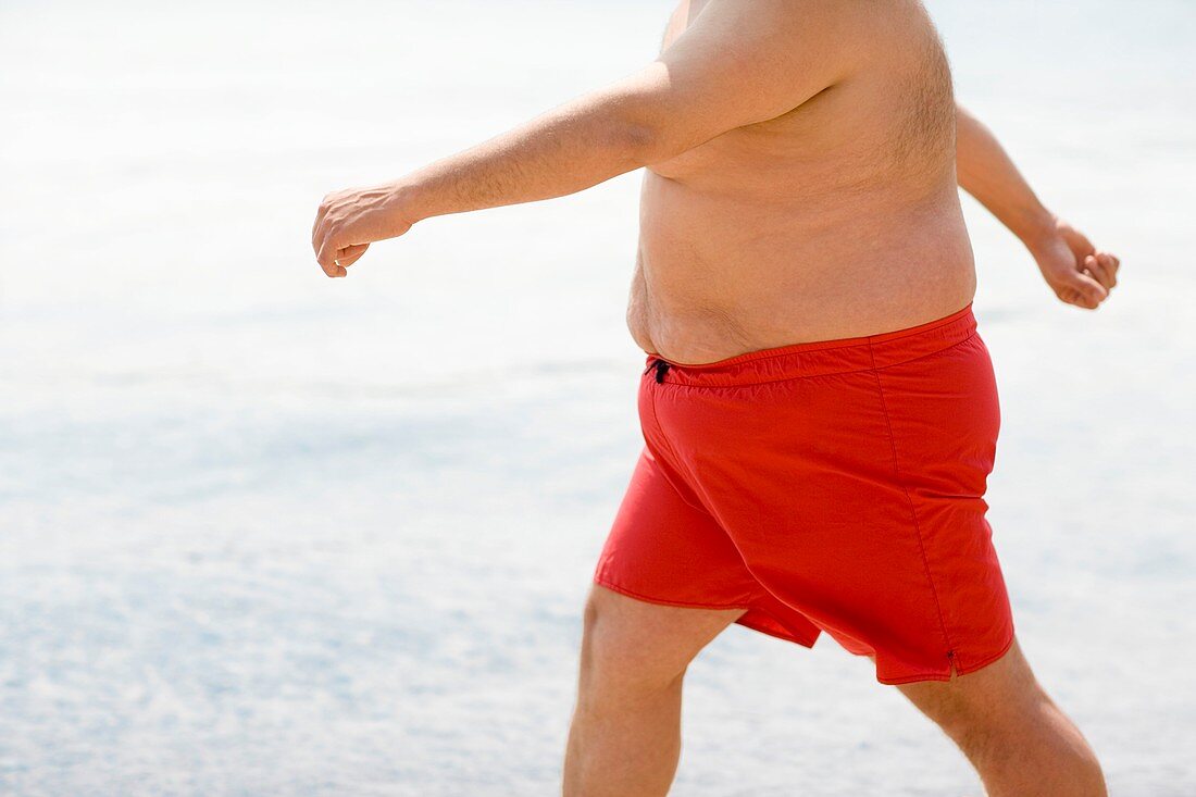 Overweight man walking