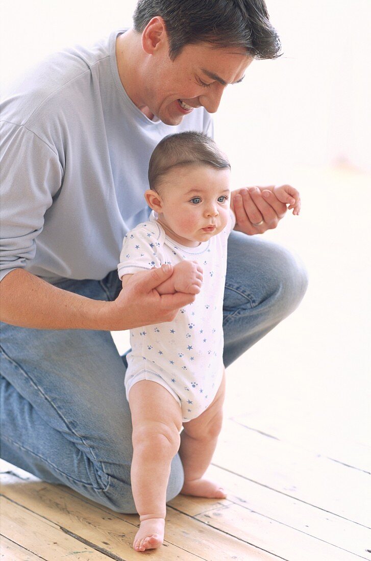 Baby boy and father