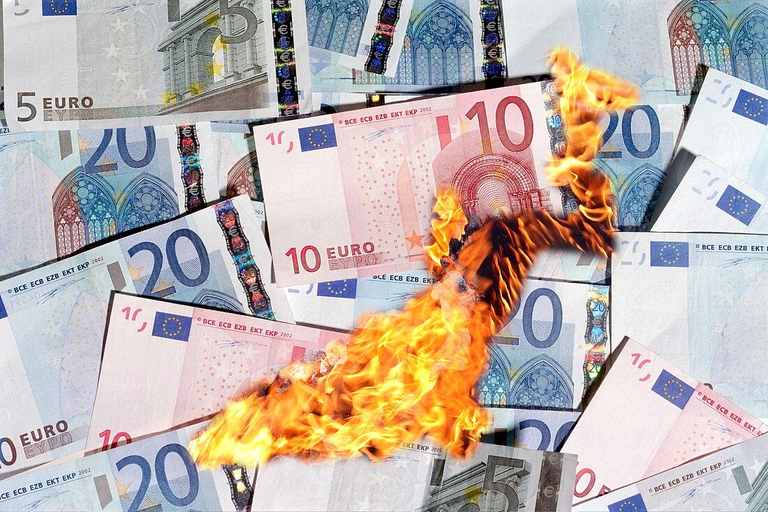 Burning money,conceptual image