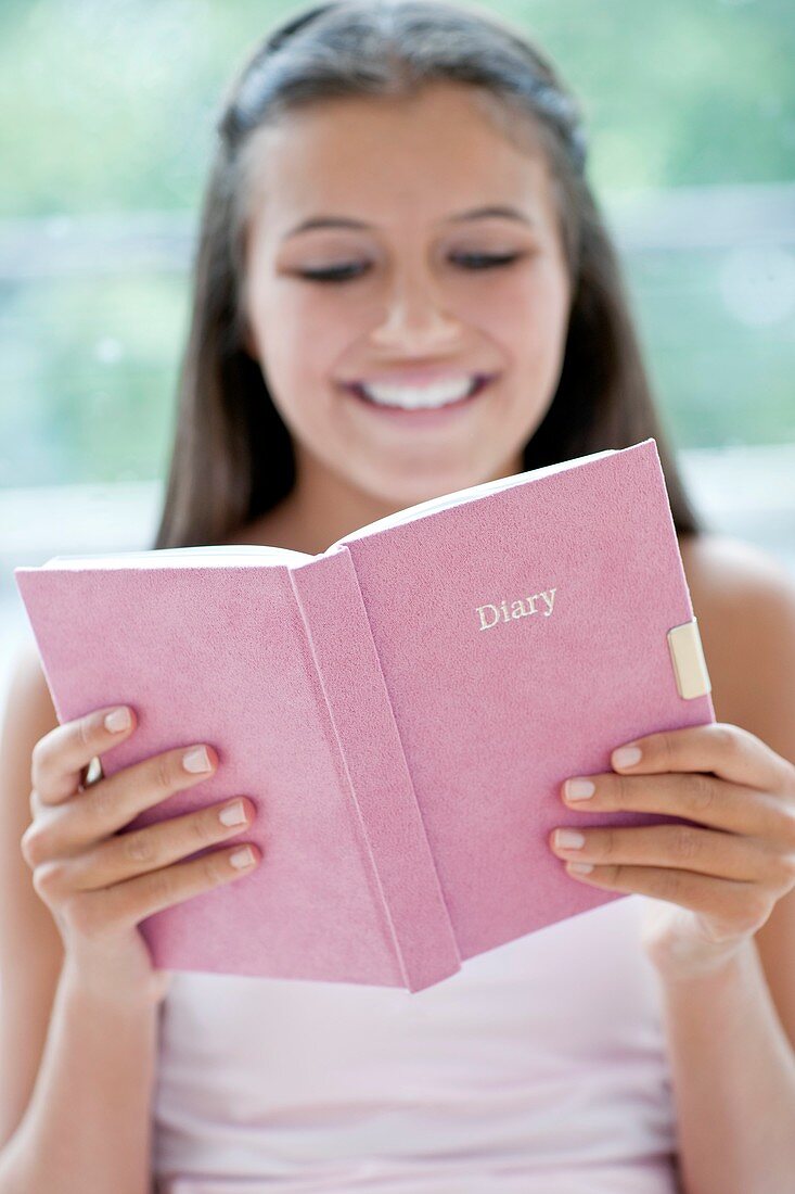 Teenage girl and her diary