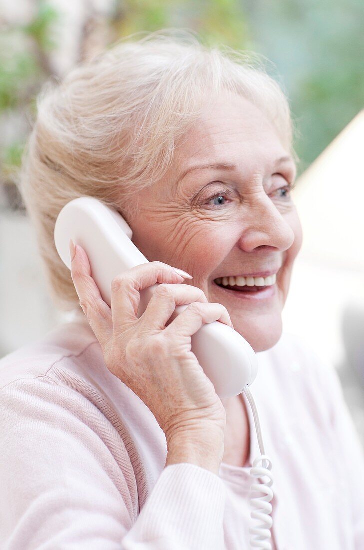 Senior woman talking on the telephone