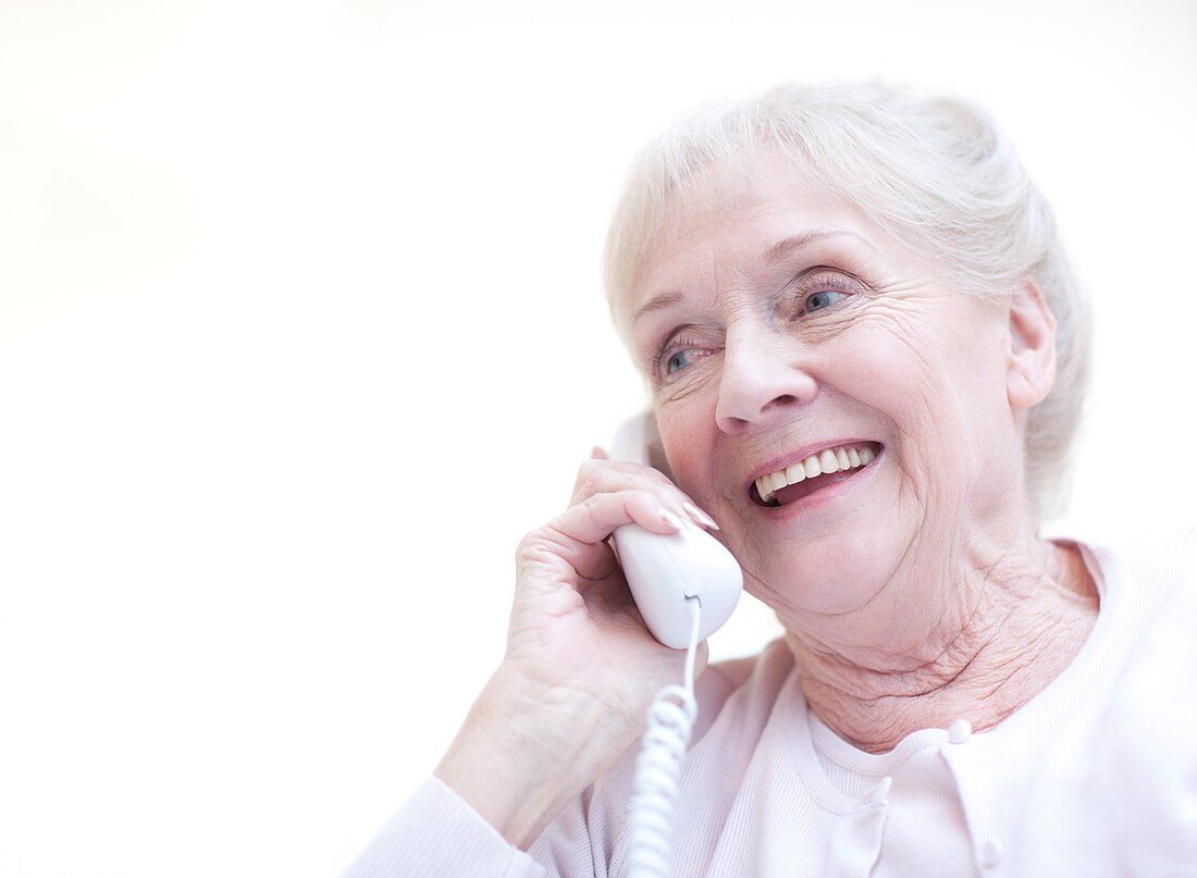 Senior woman talking on the telephone