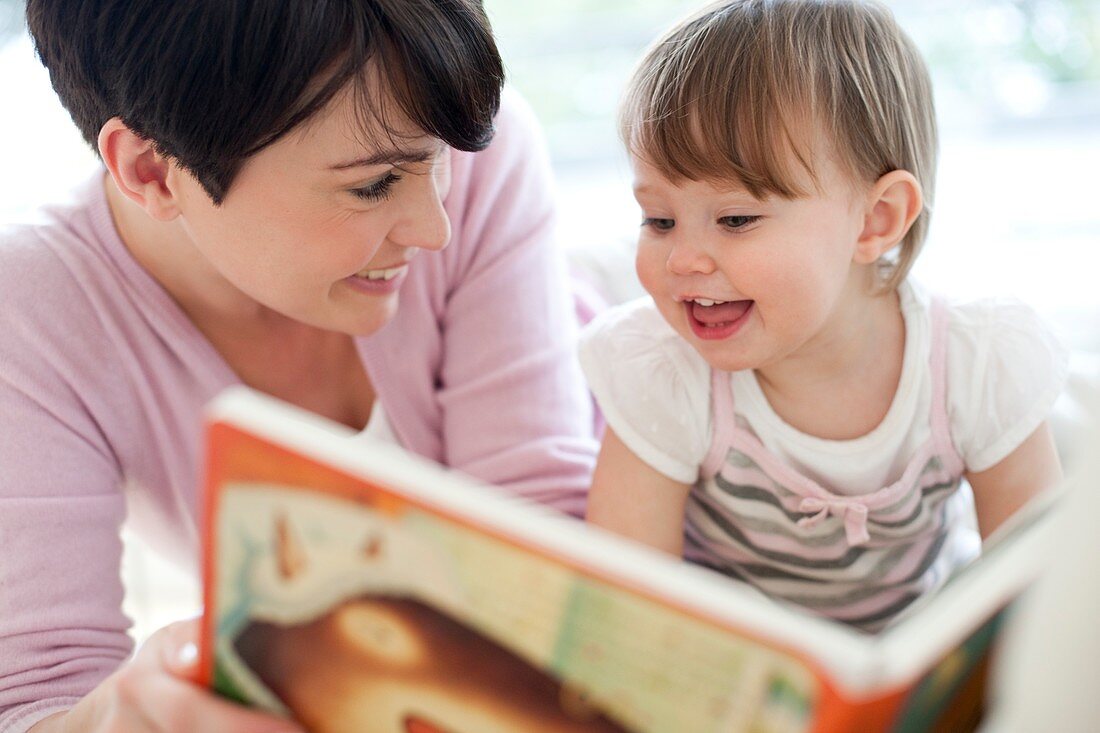 Mother and daughter reading