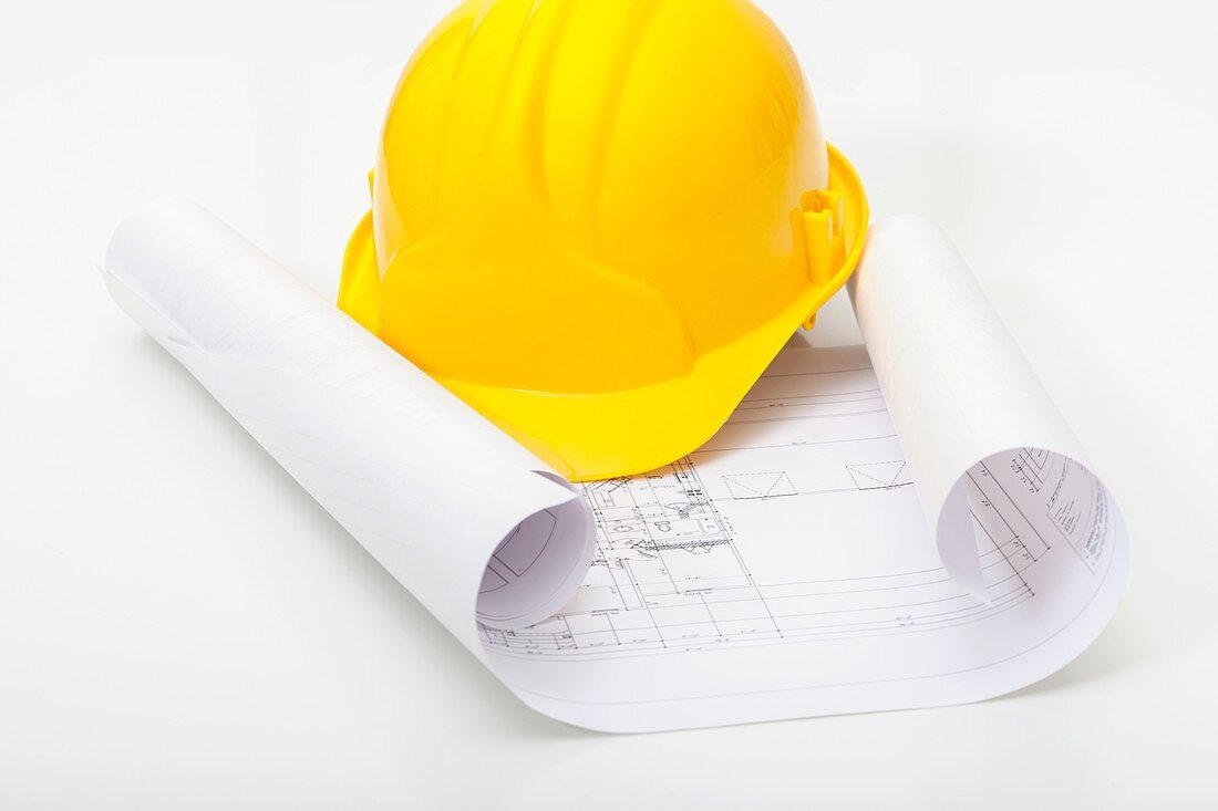 Hard hat and building plans