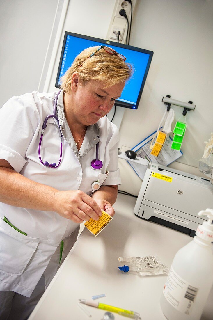 Nurse preparing drugs