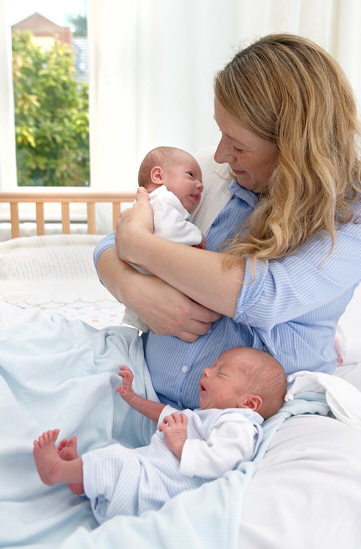 Mother and two week old twins