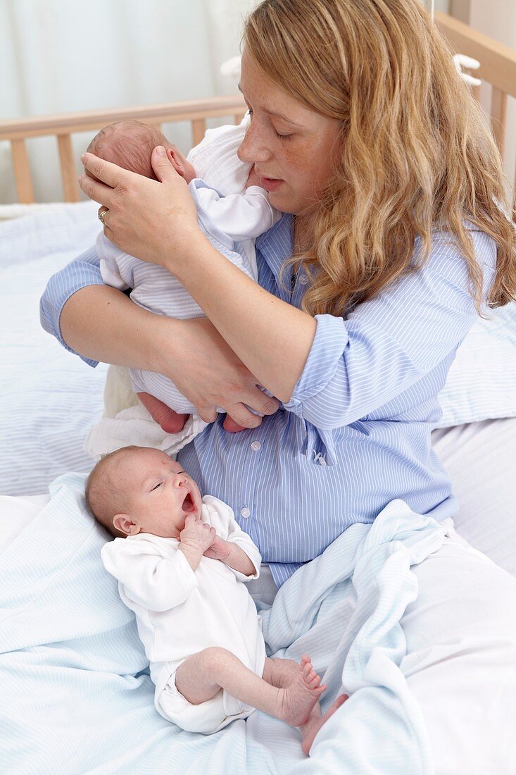 Mother and two week old twins