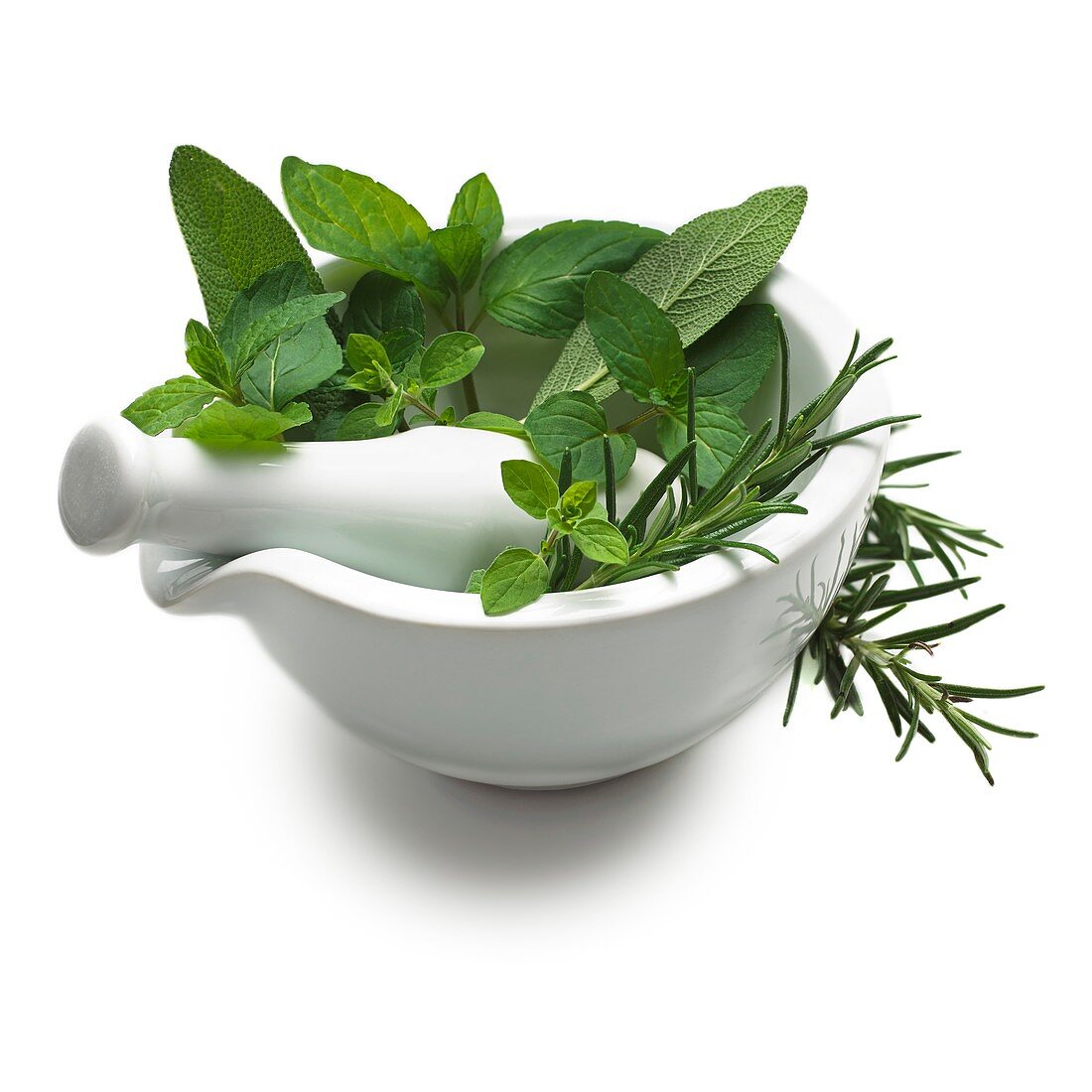 Herbs in a mortar and pestle