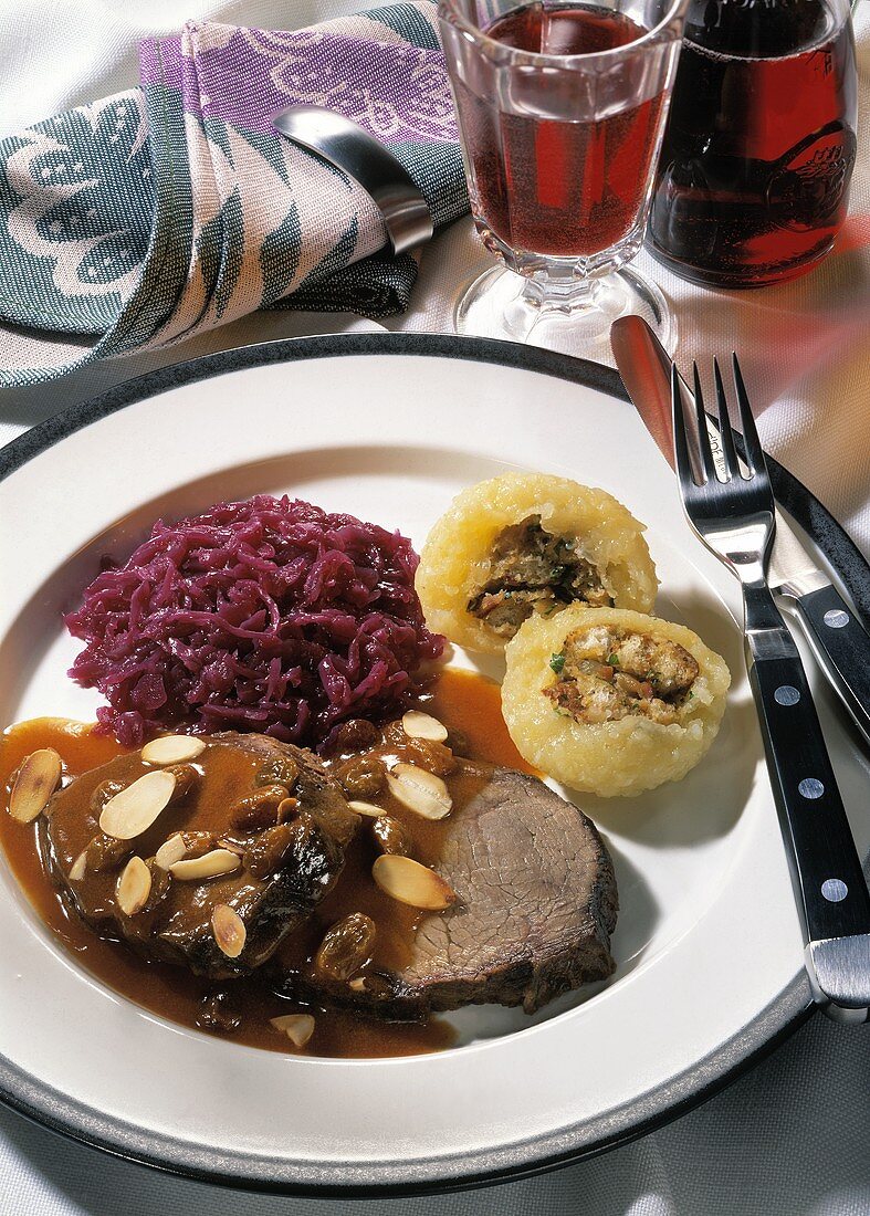 Stewed steak with red cabbage & stuffed potato dumplings